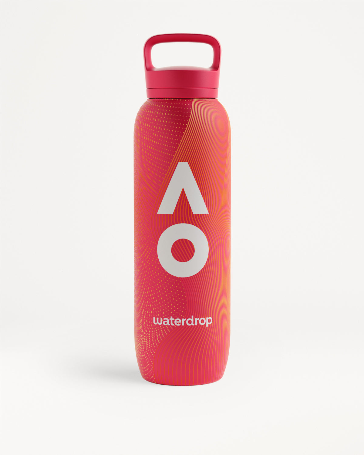 Pink-to-red plastic sports bottle with a screw-on cap and built-in carrying handle.
