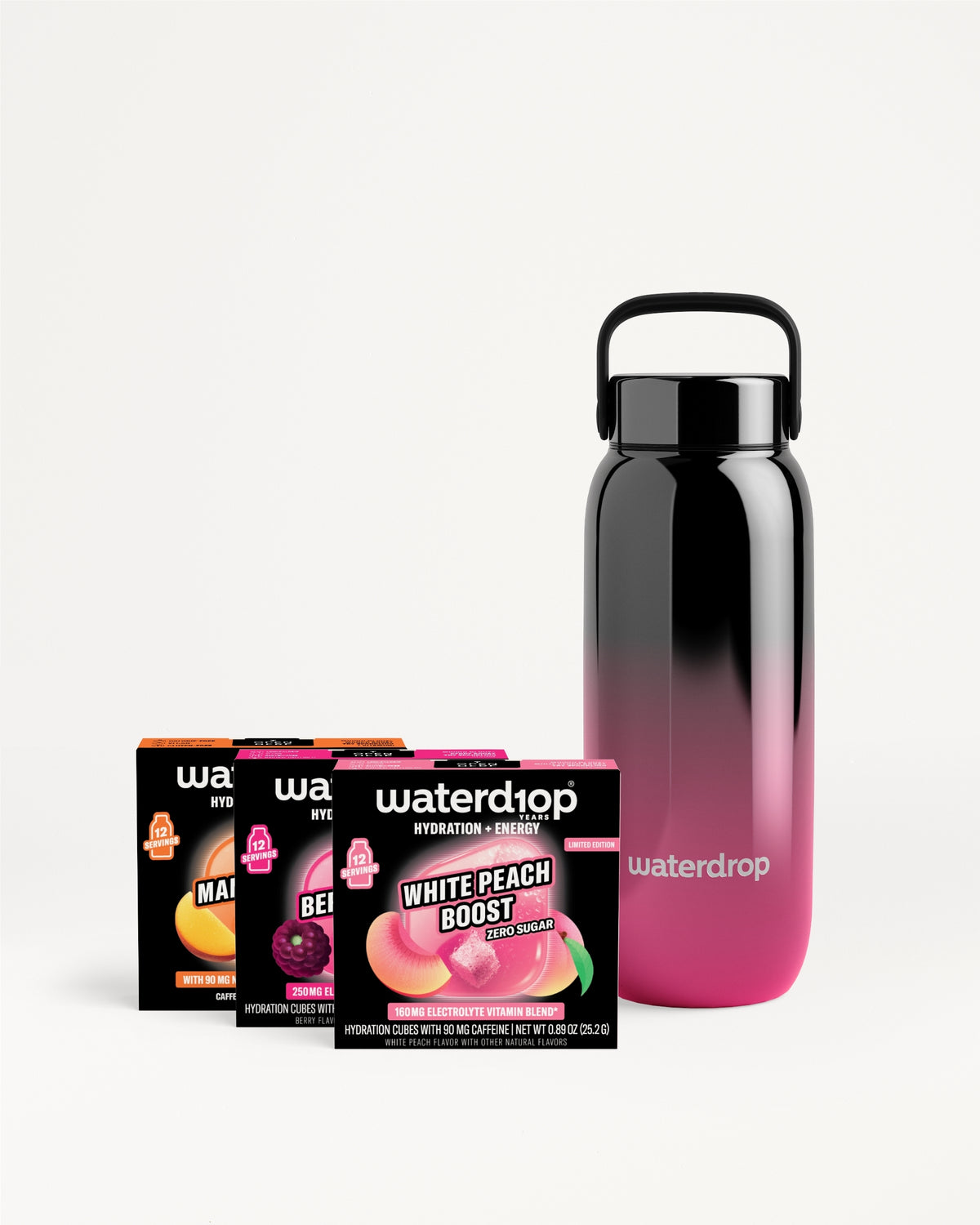 Gradient black-to-pink reusable water bottle with a handle, displayed with several flavor packs.