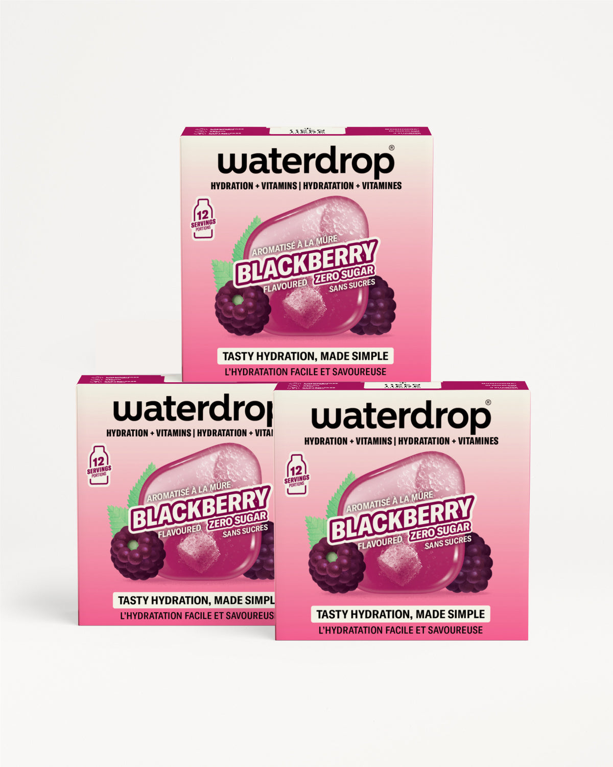 Three pink Waterdrop hydration tablet boxes stacked on a white background.