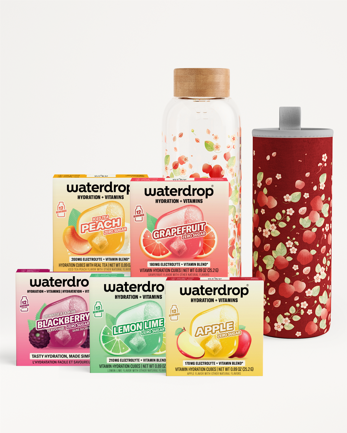 Assortment of Waterdrop hydration and vitamins boxes with a clear bottle and a red patterned tumbler.