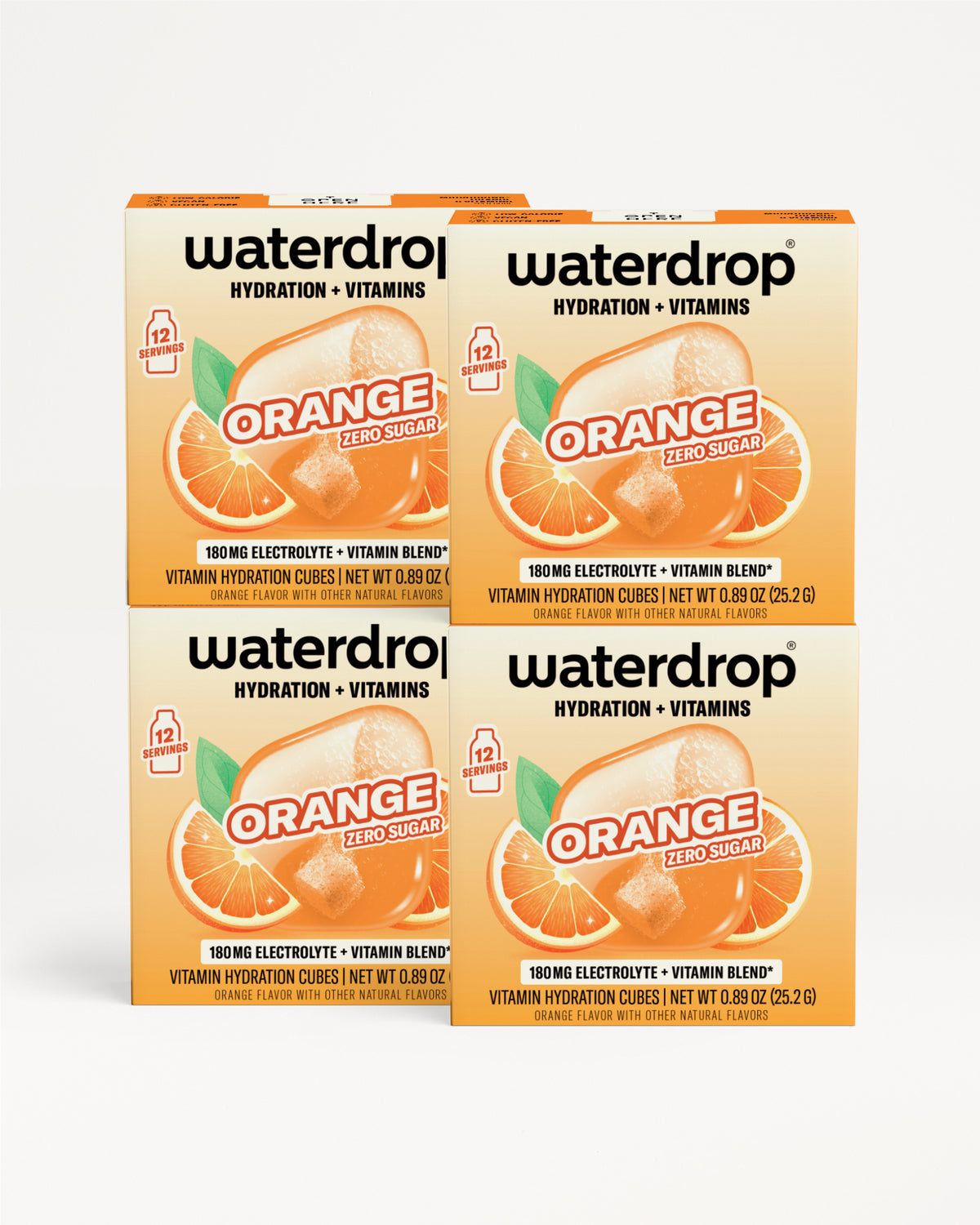 Four orange-flavored Waterdrop electrolyte and vitamin drink mix boxes stacked together