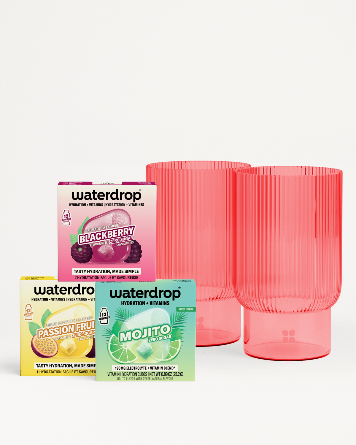 Three Waterdrop capsule packs with two pink translucent cups on a neutral backdrop.