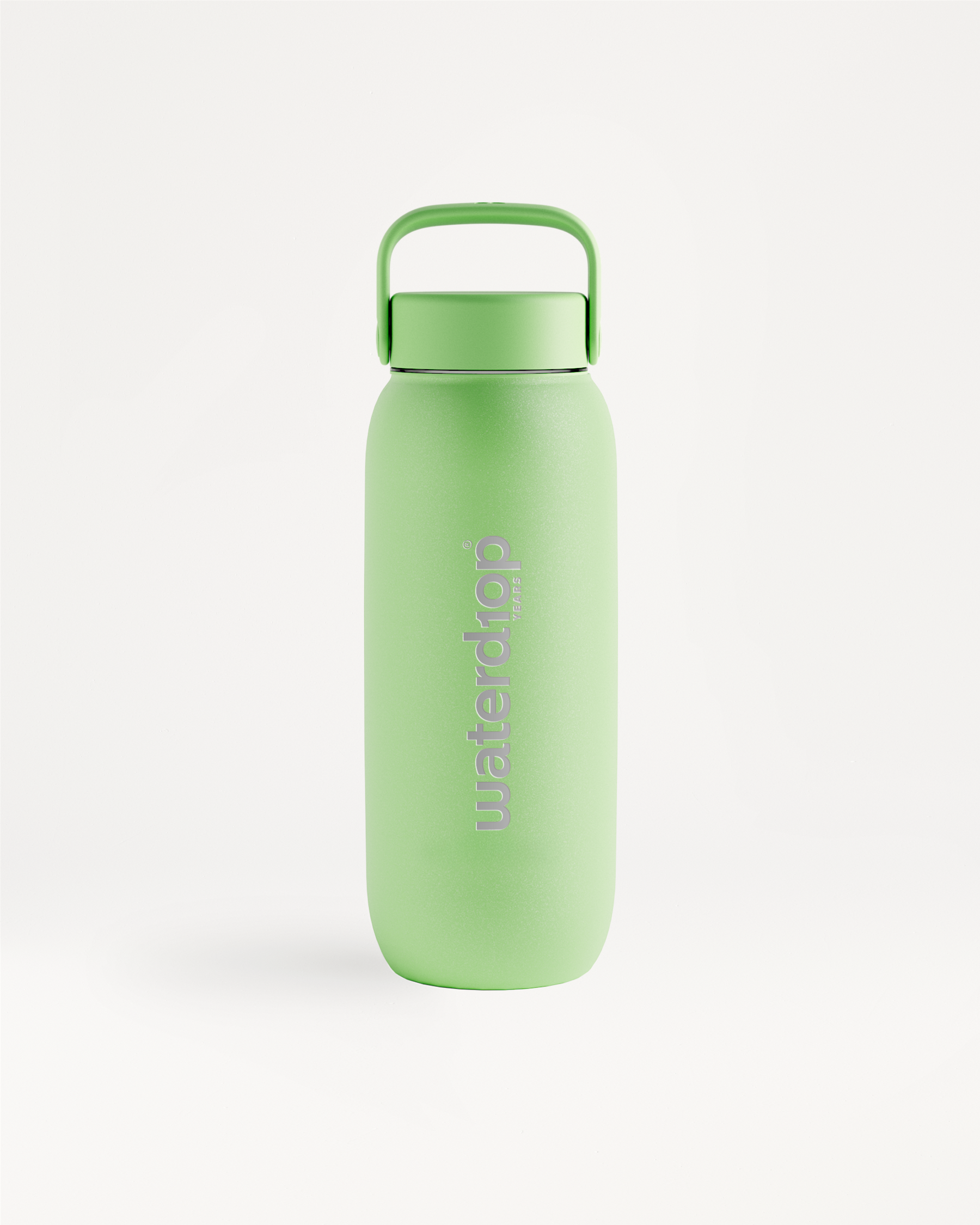 Green reusable water bottle with a matching green cap and built-in carrying handle, standing upright on a white background.