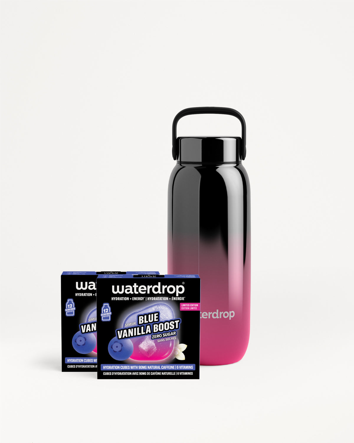 Gradient black-to-pink reusable water bottle with a handle beside boxed Waterdrop product.
