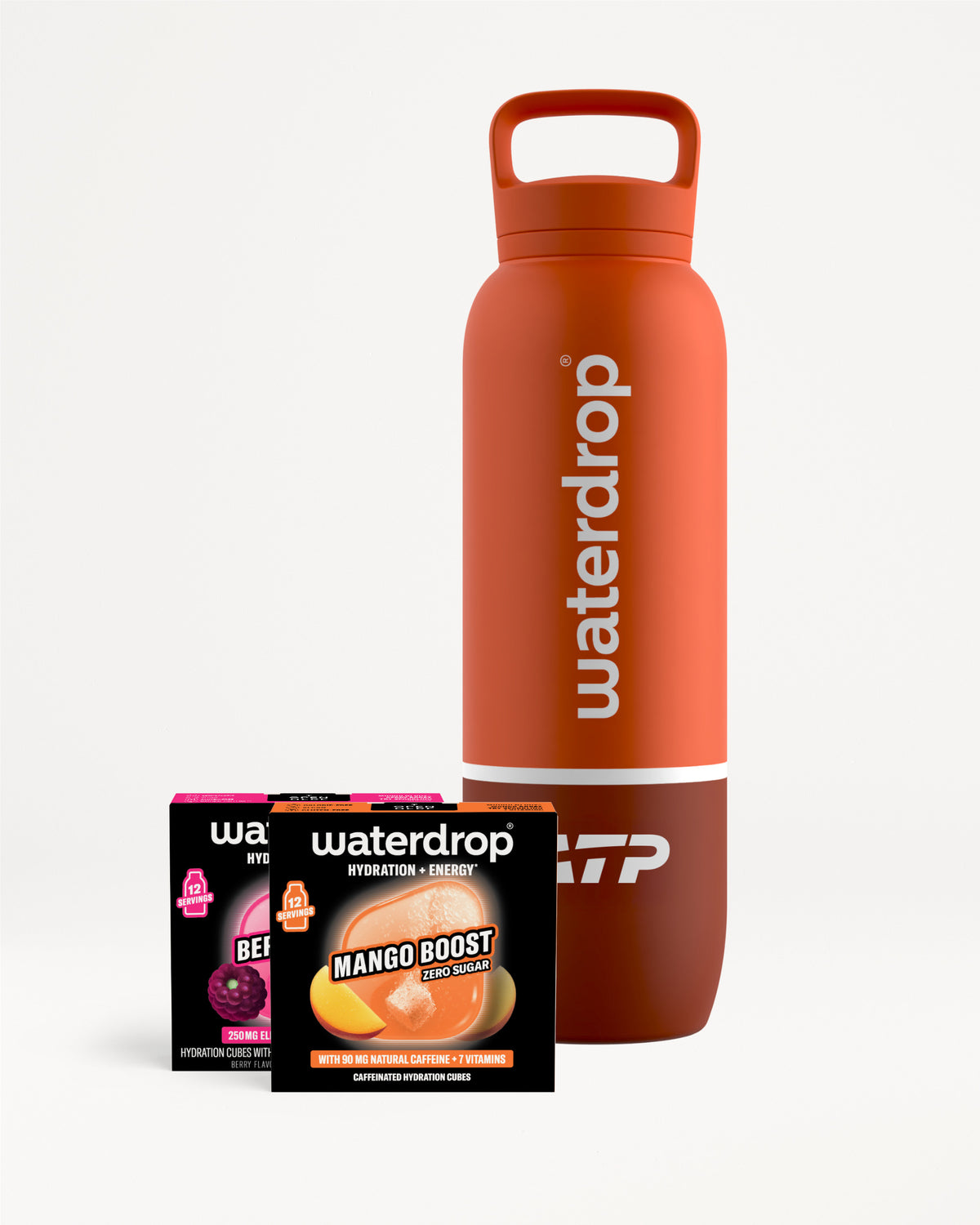 Red sports water bottle with a built-in handle, beside two small sachets.