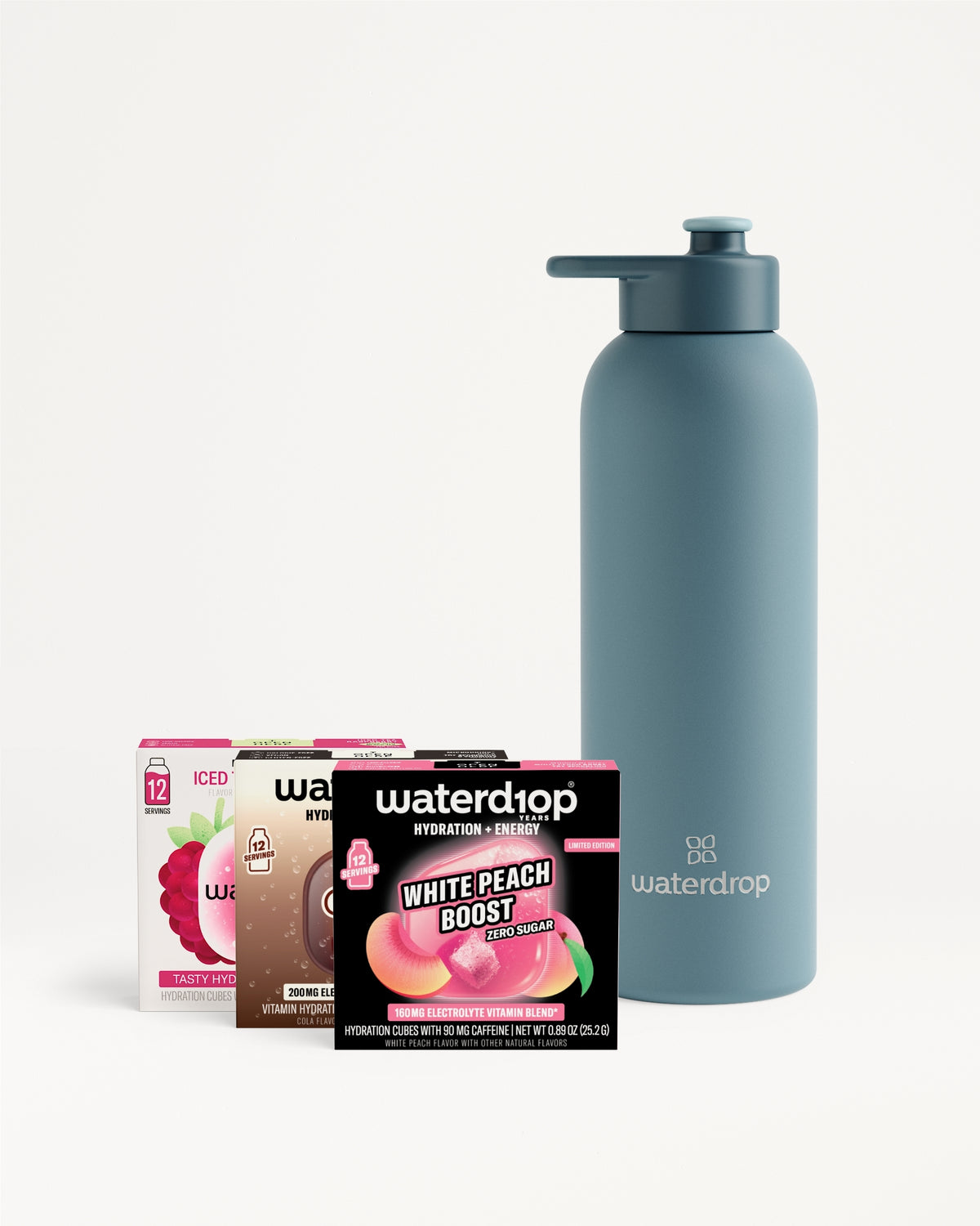 Blue pump bottle next to assorted Waterdrop flavor sachet boxes.