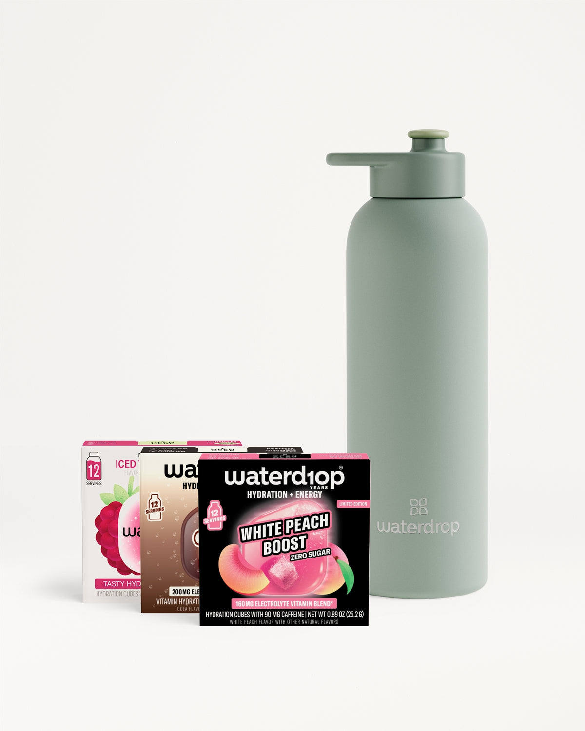 Matte gray water bottle with a pump beside a row of assorted Waterdrop flavor boxes.