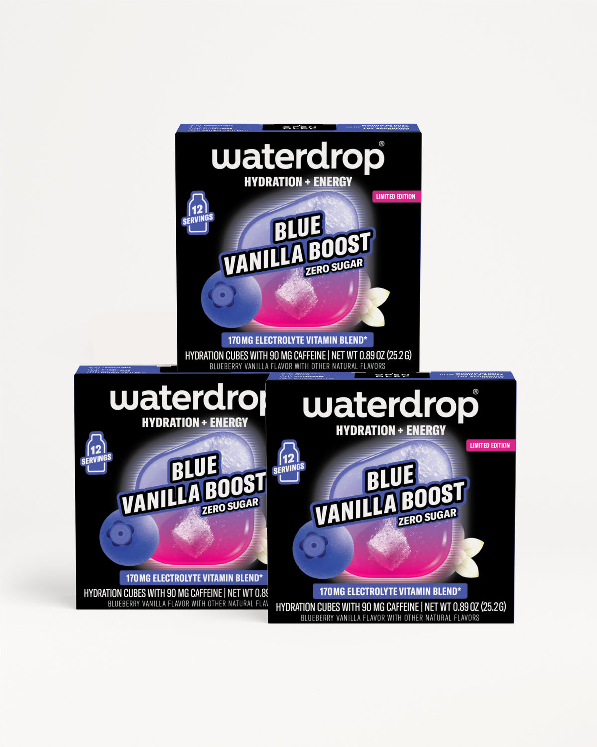 Three black beverage boxes with blue and purple accents stacked in a pyramid.