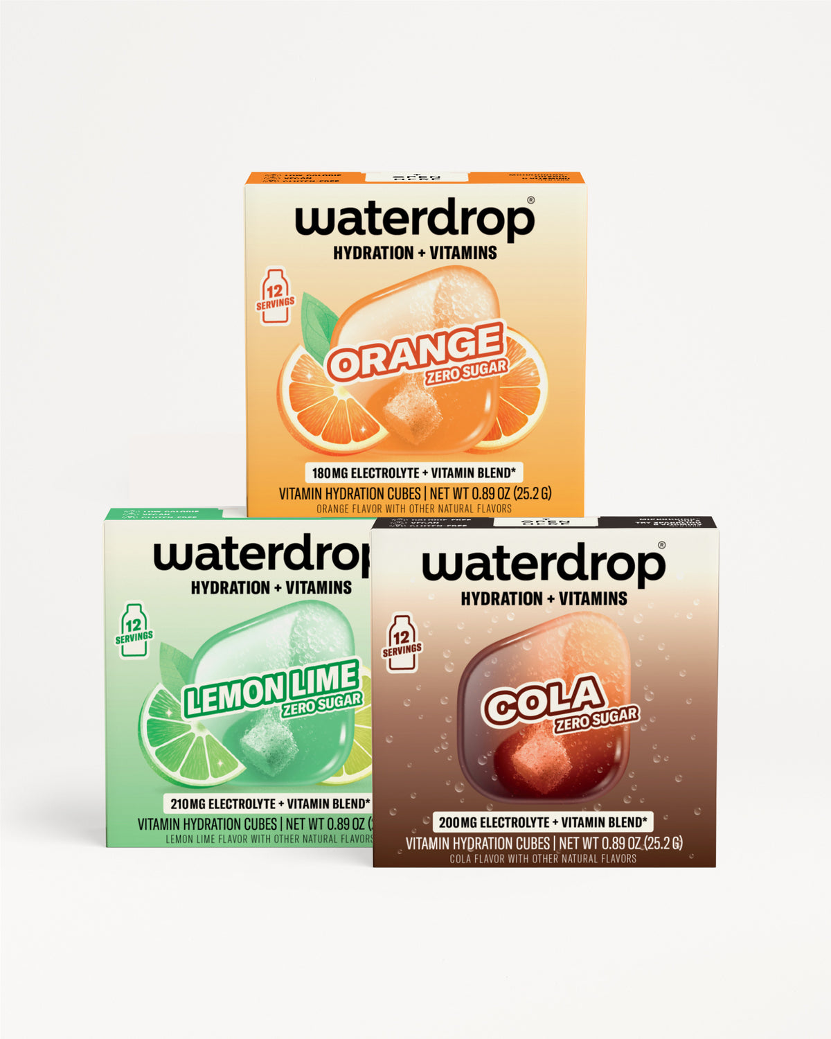 Three Waterdrop hydration and vitamins boxes stacked, with orange, lemon lime, and cola color accents.