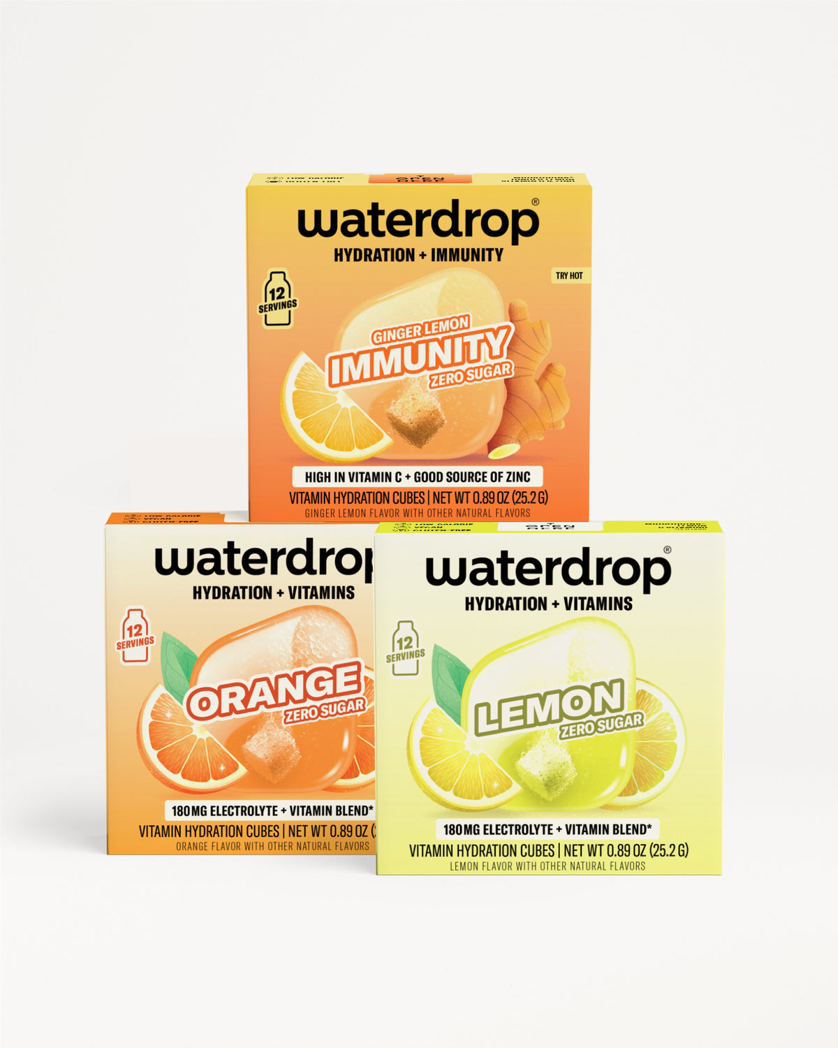 Three Waterdrop hydration and vitamins boxes stacked in a pyramid on a white background.
