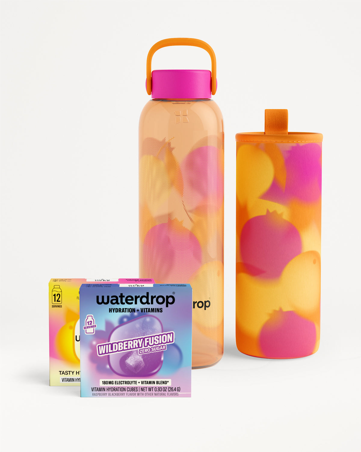 Two tall reusable water bottles with pink and orange marbled patterns and matching lids, beside a box of hydration drops.