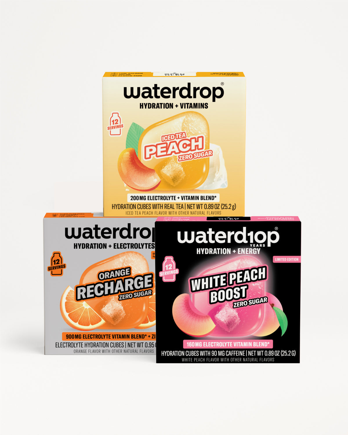 Three Waterdrop boxes stacked in a pyramid with yellow, orange, and black-purple packaging and fruit graphics.